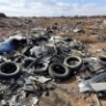 Посетителям астраханского кладбища приходится пробираться через горы мусора