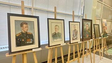 В Госдуме открылась выставка "Портрет Героя", посвященная защитникам Отечества