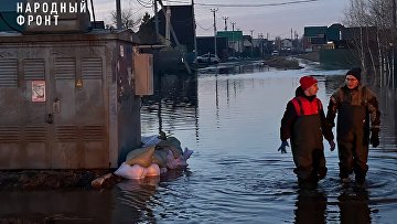 Волонтеры НФ помогают бороться с последствиями паводка в селе Хомутово