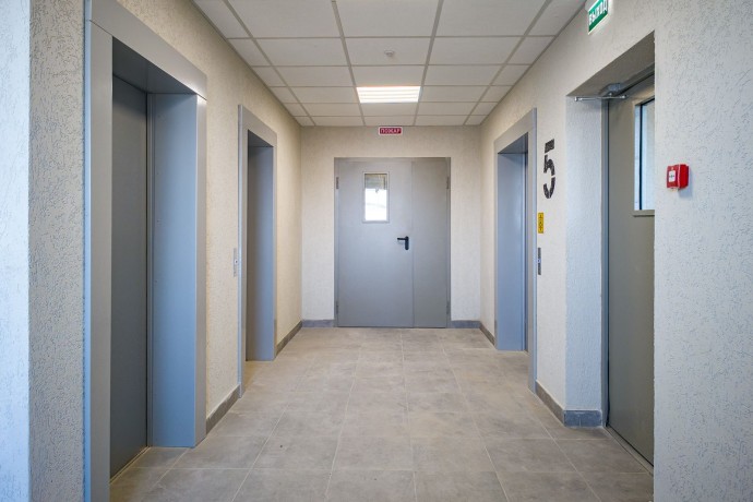 Около 390 участников программы реновации уже оформили документы на новое жилье на Базовской улице