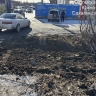 Яму на дороге в Южно-Сахалинске, в которую могли провалиться автомобили, засыпали