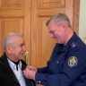 Заместитель Председателя СК России встретился с участником акции «Дни белых журавлей» и вручил ему медаль