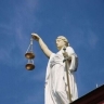 Курянина осудили за повреждение автомобиля соседа по гаражу