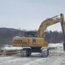 На севере Приамурья расчистили участок трассы после выхода воды