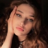 Мила